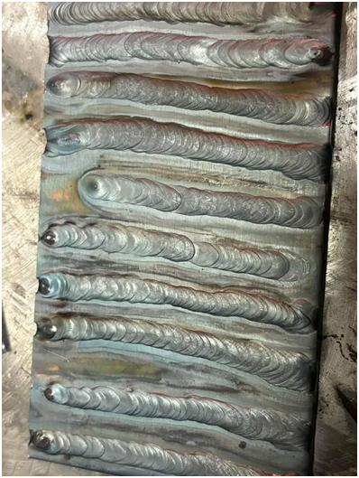 Welding bead practice on scrap metal showing beginner welding straight bead technique for how to start welding at home